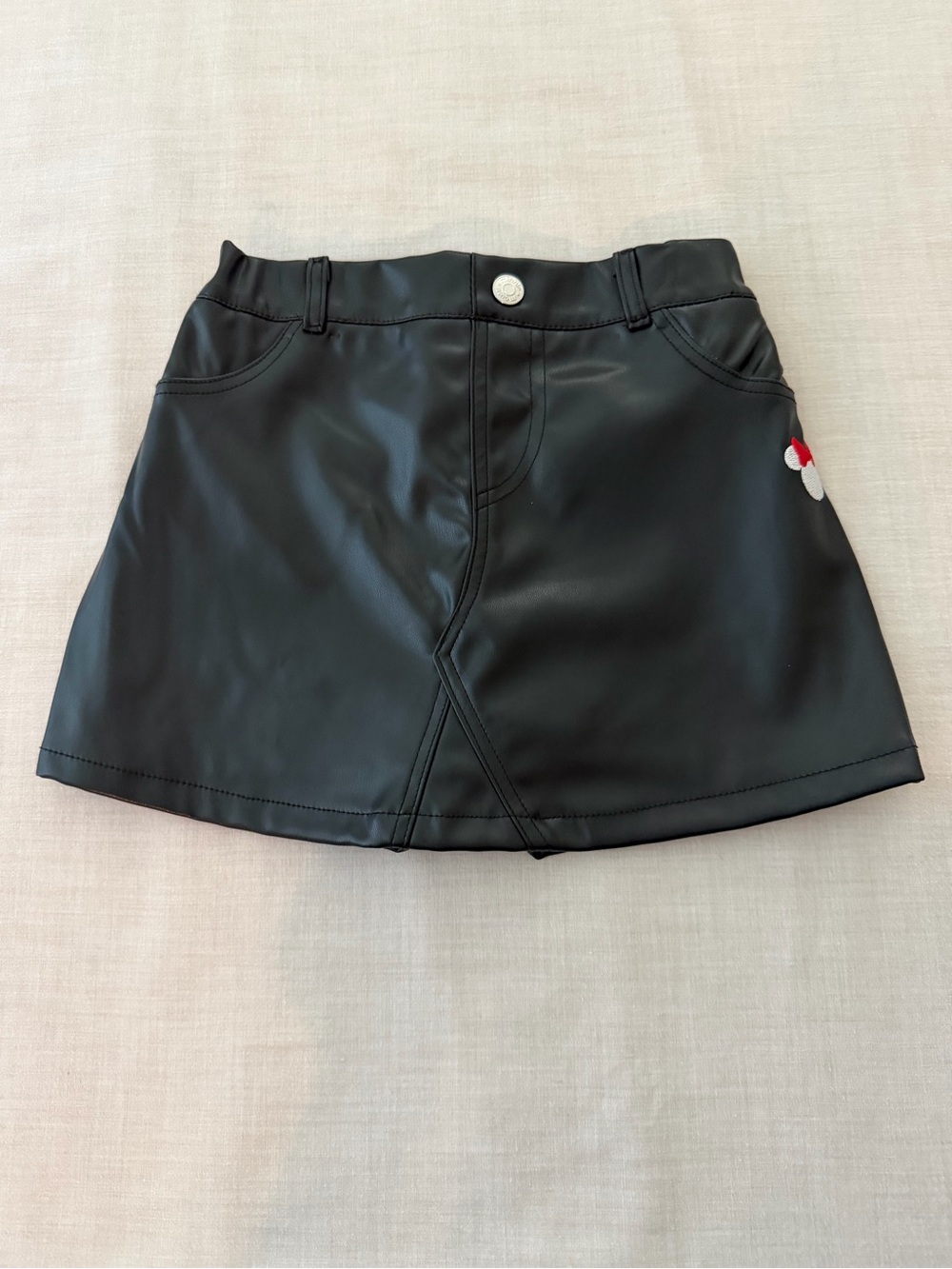 Disney Black Faux Leather Mini Skirt with Small Embroidered Accent